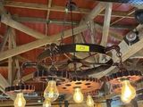 a large chandelier that has a lot of lights hanging from it