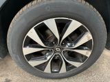 a close up view of a tire on a car