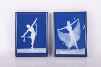 two framed pictures of a ballerina and a dancer on a blue background