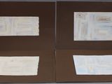 two pieces of paper that are on top of each other