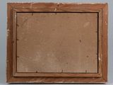 an old picture frame with a piece of cardboard in it