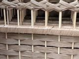 a close up of a basket that has a handle on it