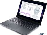a laptop that is open and has a drawing of a person ' s face on the screen