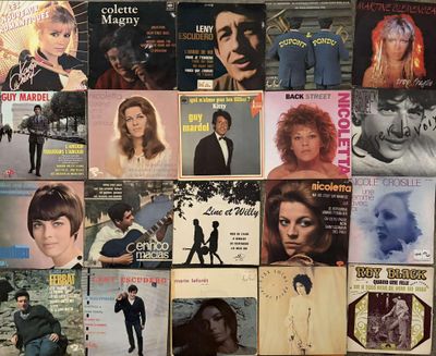 a lot of music covers on the wall of a room