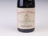 a bottle of wine that is sitting on a table