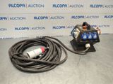 a couple of hoses sitting on top of a table next to a wall