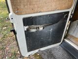 a door of a van that has a broken window
