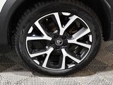 a close up view of a tire on a vehicle