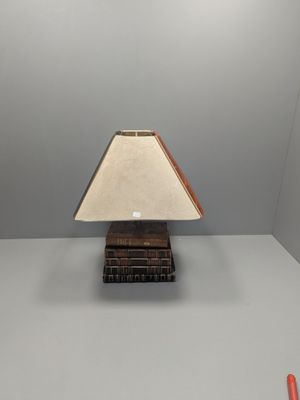 an image of a lamp that is on top of a table