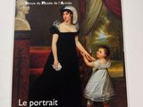 the front cover of a magazine with a painting of a woman and a child