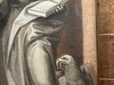 a painting of a woman holding a book and a dog