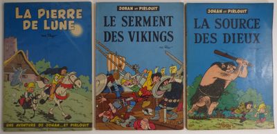 trois livres pour enfants sont alignés sur une surface blanche