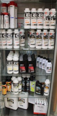 a display case with many different types of paint on it