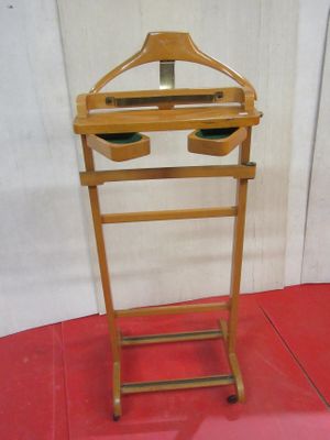 a small wooden stand with two bowls on it