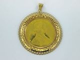 an image of a gold coin with a woman ' s face on it