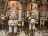 a lot of nutcrackers on display in a store