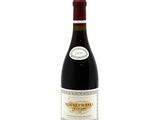 a bottle of wine that is sitting on a table