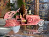 a toy car that is sitting on a glass table