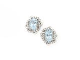 a pair of aquamarinee and diamond earrings