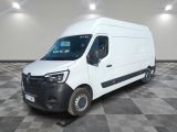 the white van is parked on a checkered floor in a room