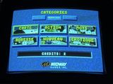 a video game on the screen of a restaurant