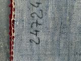 a close up of a piece of fabric with a stitching on it
