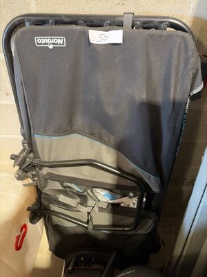 a luggage bag sitting on the floor next to a door