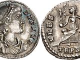 a silver coin with an image of a man on it