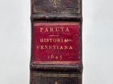 an old book that is sitting on top of a table