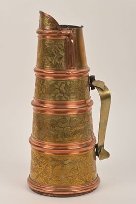 a copper pitcher with a handle on a white background