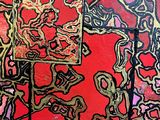 abstract painting of a red and black square with a gold border