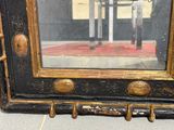 une photo du reflet d'un homme dans un miroir