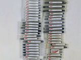 a bunch of batteries sitting on top of each other on a table