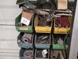 a stack of assorted tools in a garage