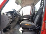 a picture of a red van with the door open