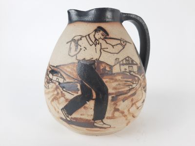 a vase with a picture of a man on it