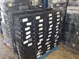 many stacks of boxes in the warehouse with labels on them