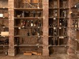 many bottles of wine on the shelves in the room