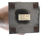 a metal object that has a label on it