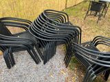 a lot of chairs that are sitting on the ground