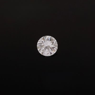 a round brilliant cut diamond on a black background