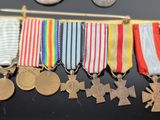 many medals and medals on display on a table