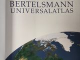 an image of a book with a picture of the earth on it