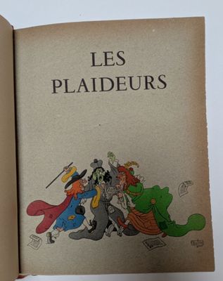 un livre ouvert sur lequel figure l'image d'un groupe de personnages de dessins animés