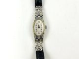 an image of a ladies ' s watch with diamonds on it