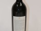 a bottle of wine that is sitting on a table