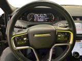 a steering wheel and dashboard of a car on display