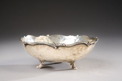 silver plated bowl on stand on grey background with gray background