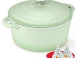 green casserole pot with lid and a tea bag next to it