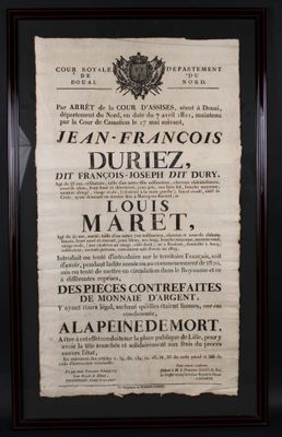 une affiche en noir et blanc, encadrée de noir, accrochée au mur
